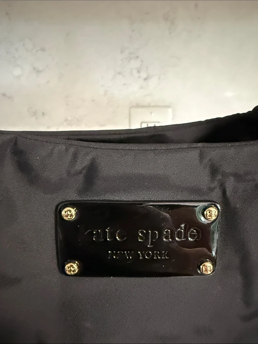 kate spade Black Nylon Shoulder Bag with Gold-Tone Plaque & Polka Dot Lining